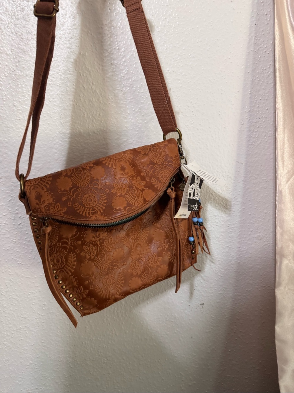 The Sak Brown Floral-Embossed Crossbody Bag with Tassel - Picture 15 of 15